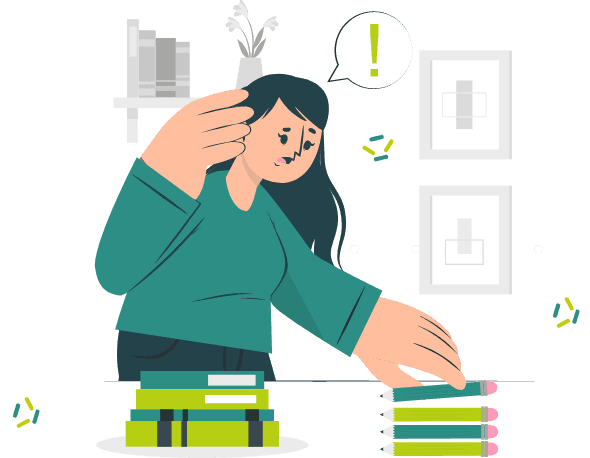 A person holding their head while lining up pencils and stacked books